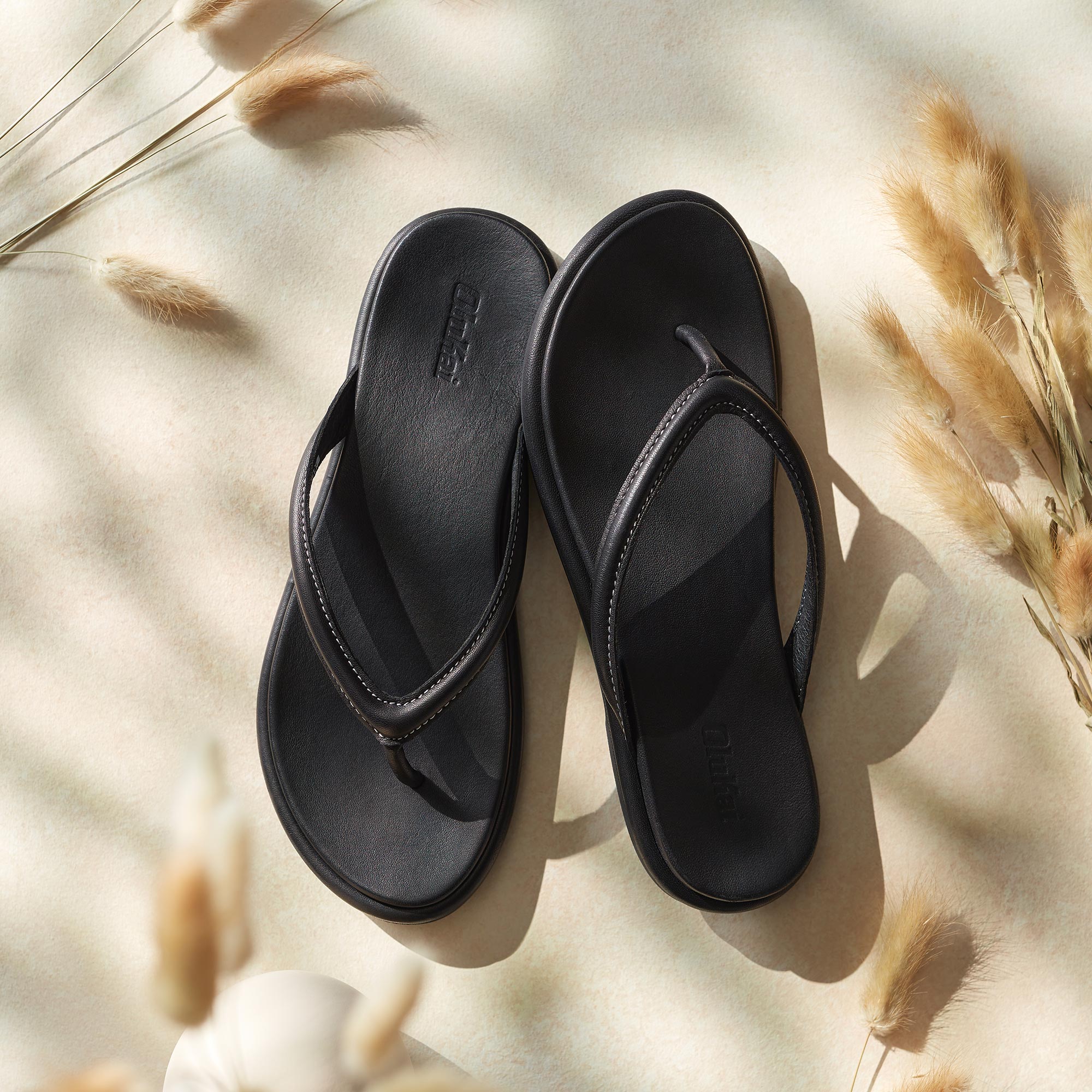 Olukai black sandals online